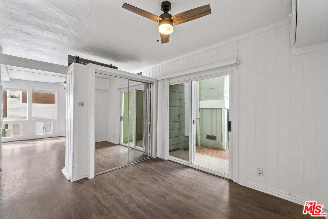 115 44th Street Manhattan Beach, CA 90266 - Photo 11 of 38 wooden floor in an empty room with a window