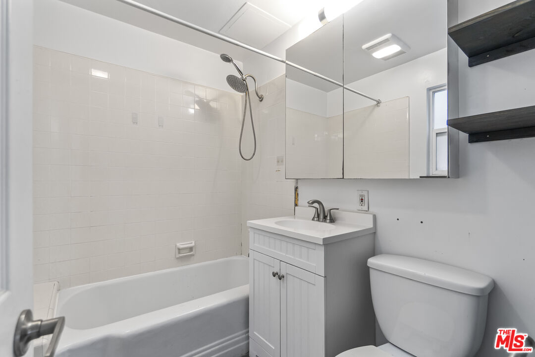 115 44th Street Manhattan Beach, CA 90266 - Photo 12 of 38 a bathroom with a sink a toilet and shower