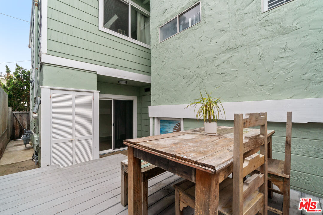 115 44th Street Manhattan Beach, CA 90266 - Photo 25 of 38 a view of a dinning table and chairs in the roof deck