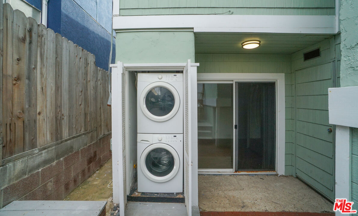 115 44th Street Manhattan Beach, CA 90266 - Photo 26 of 38 a utility room with dryer and washer