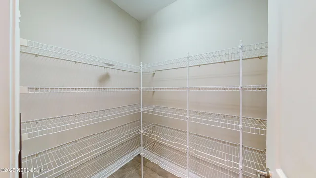 a view of a room with racks on the wall