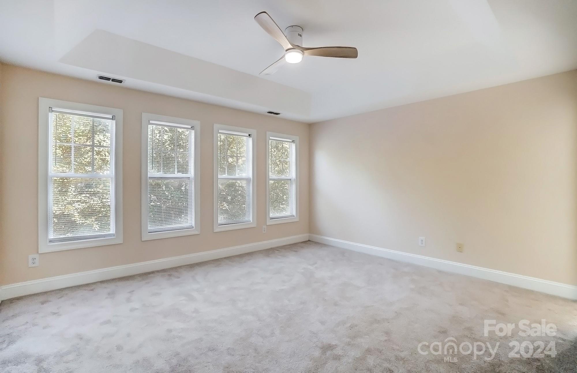14137 Wild Elm Road Charlotte, NC 28277 - Photo 19 of 36 a view of an empty room with a window