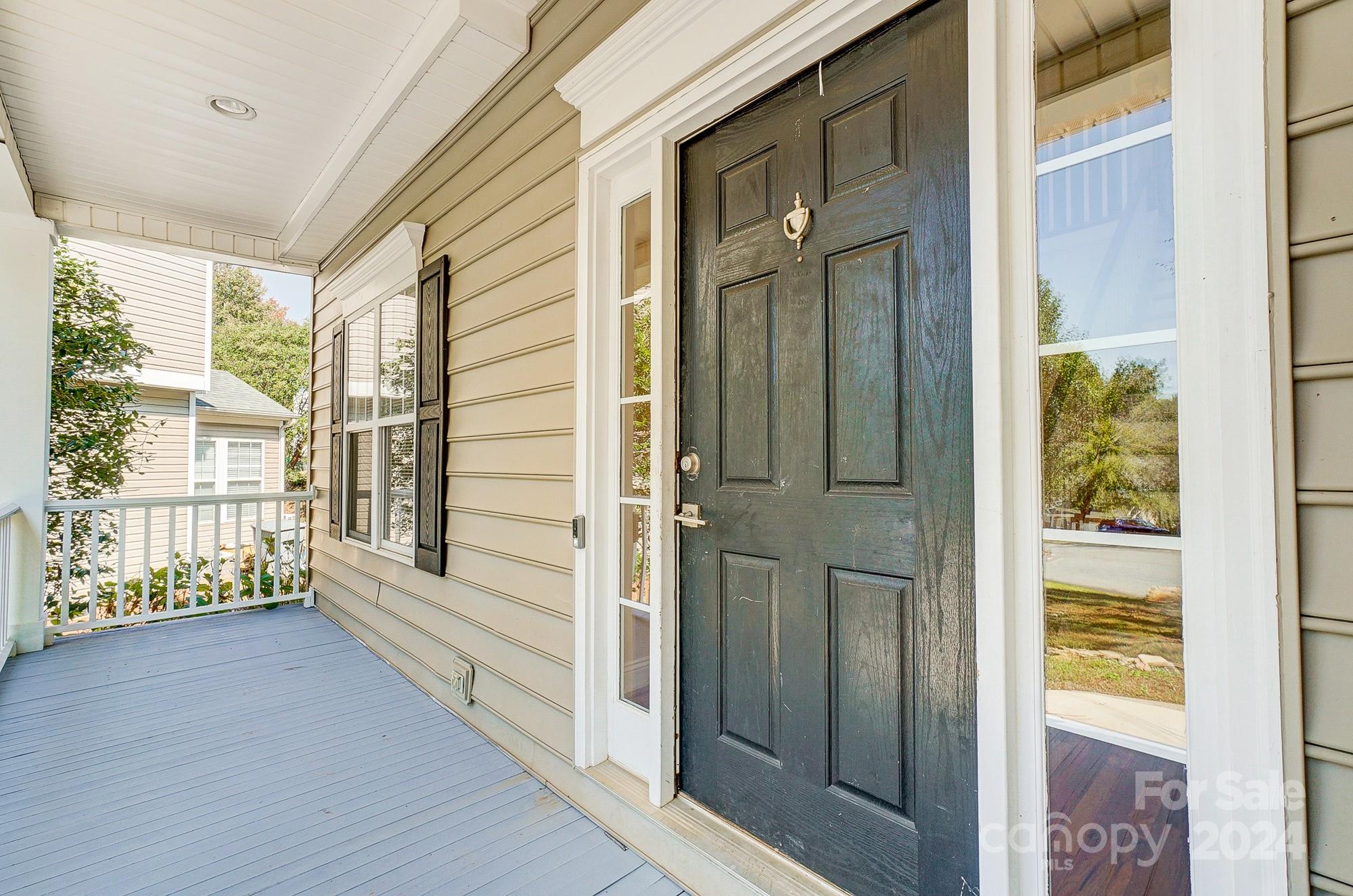 14137 Wild Elm Road Charlotte, NC 28277 - Photo 3 of 36 a view of balcony with a hallway
