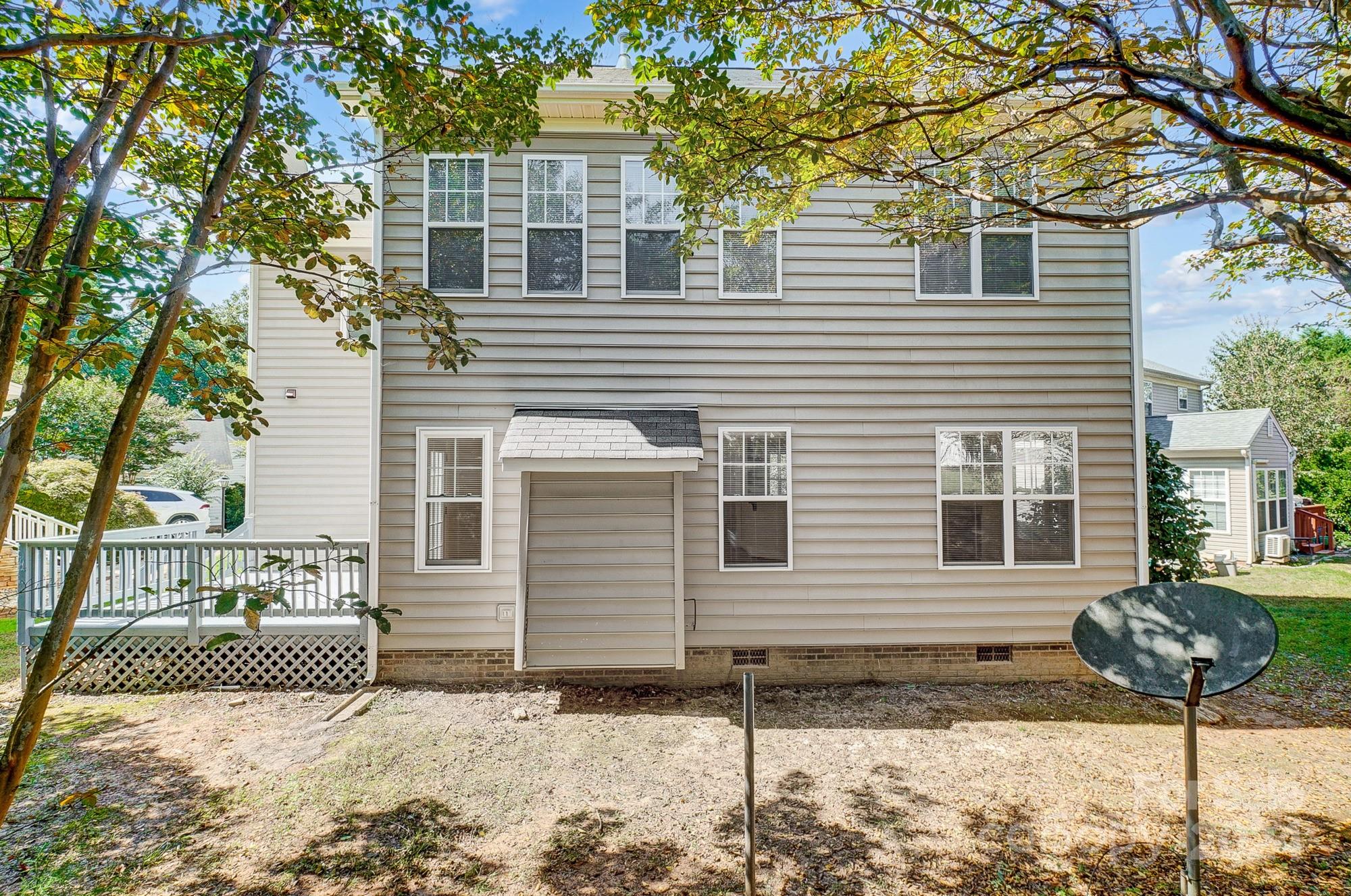 14137 Wild Elm Road Charlotte, NC 28277 - Photo 34 of 36 a front view of a house with garden