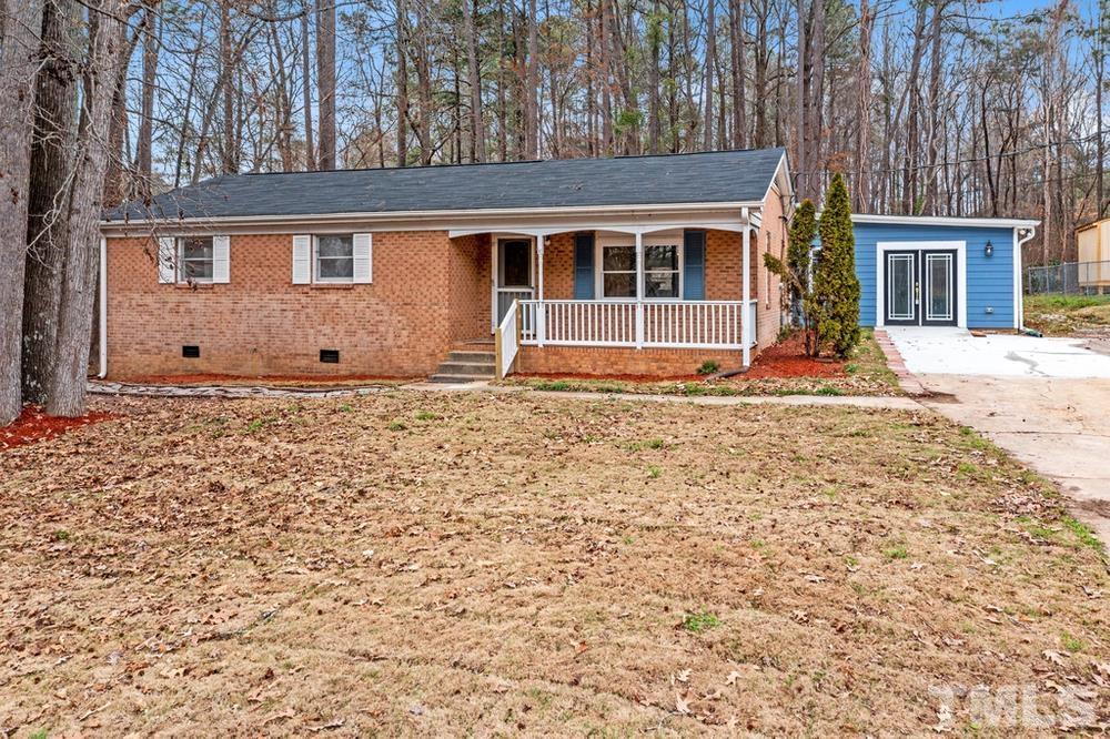 6212 Garrett Road Raleigh, NC 27606 - Photo 3 of 31 a house view with a outdoor space