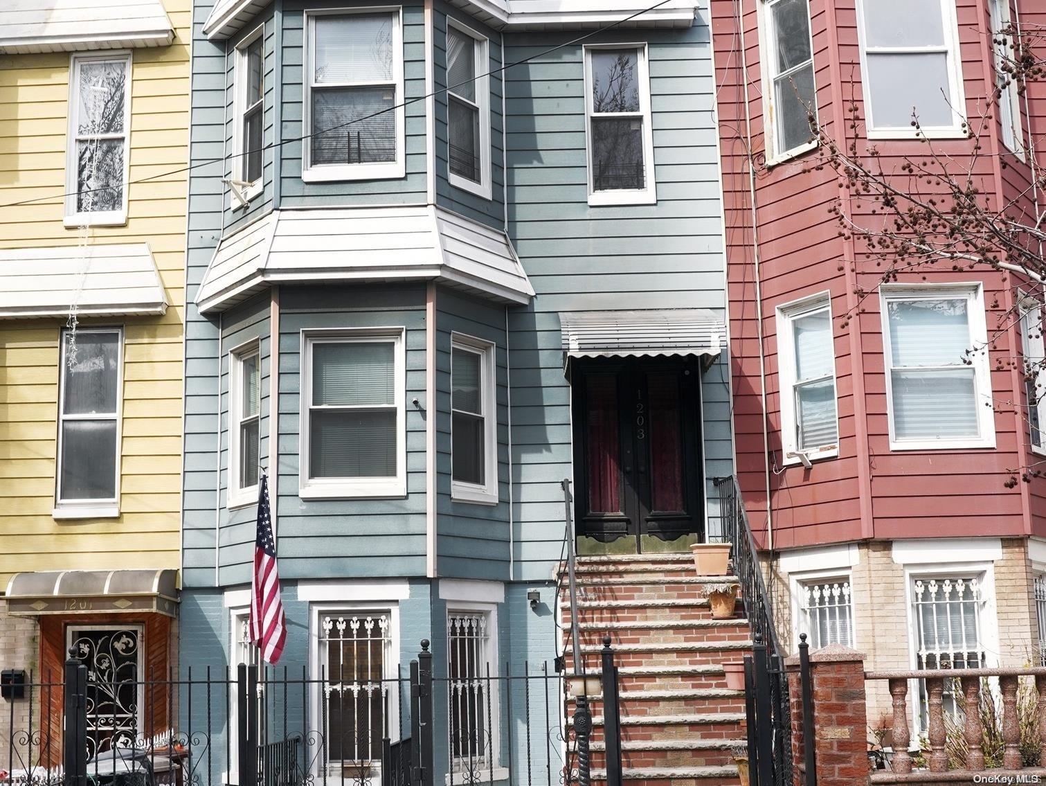 a view of a house with a window and balcony