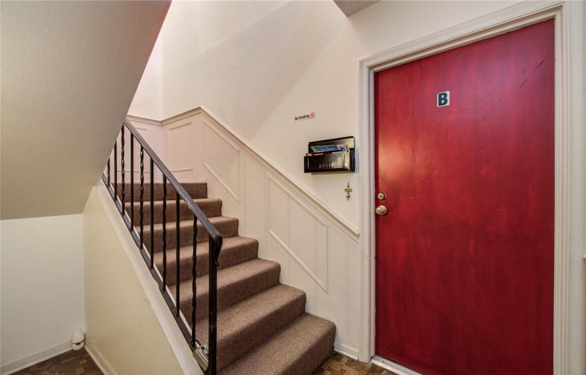 11609 Chimney Rock Road, Unit B Houston, TX 77035 - Photo 17 of 22 a view of entryway with wooden floor