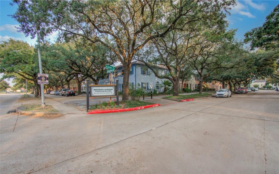 11609 Chimney Rock Road, Unit B Houston, TX 77035 - Photo 2 of 22 a view of street with tall trees