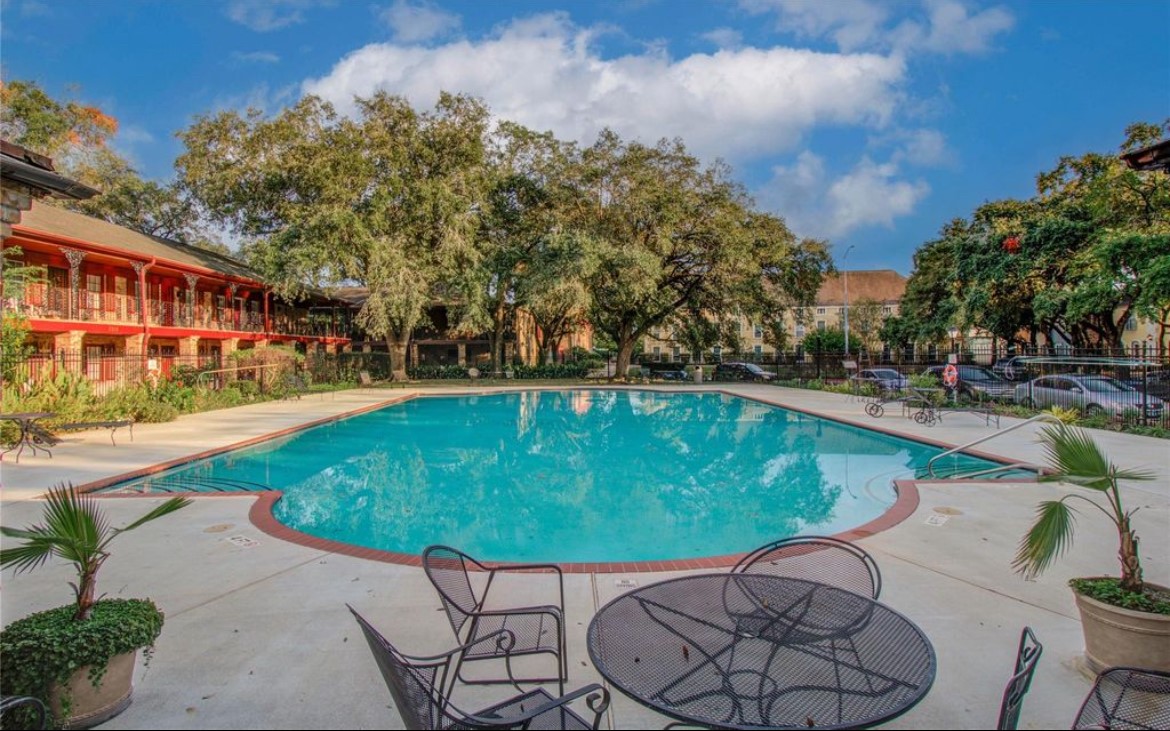 11609 Chimney Rock Road, Unit B Houston, TX 77035 - Photo 22 of 22 a view of a swimming pool with a patio