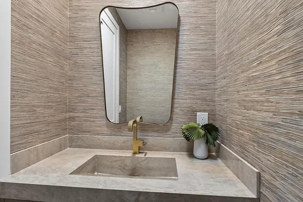 a bathroom with a sink and a toilet