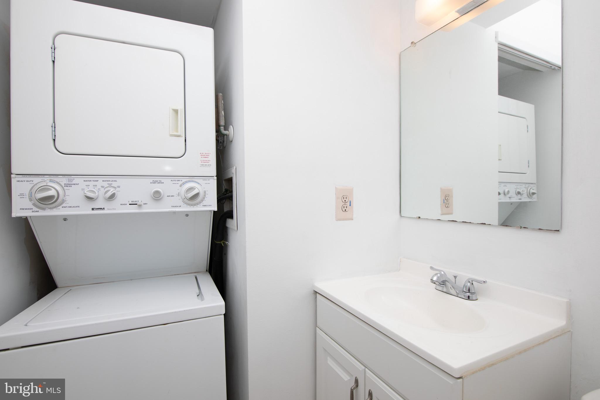 402 Gregorys Way Voorhees, NJ 08043 - Photo 11 of 27 a bathroom with a sink a mirror and vanity