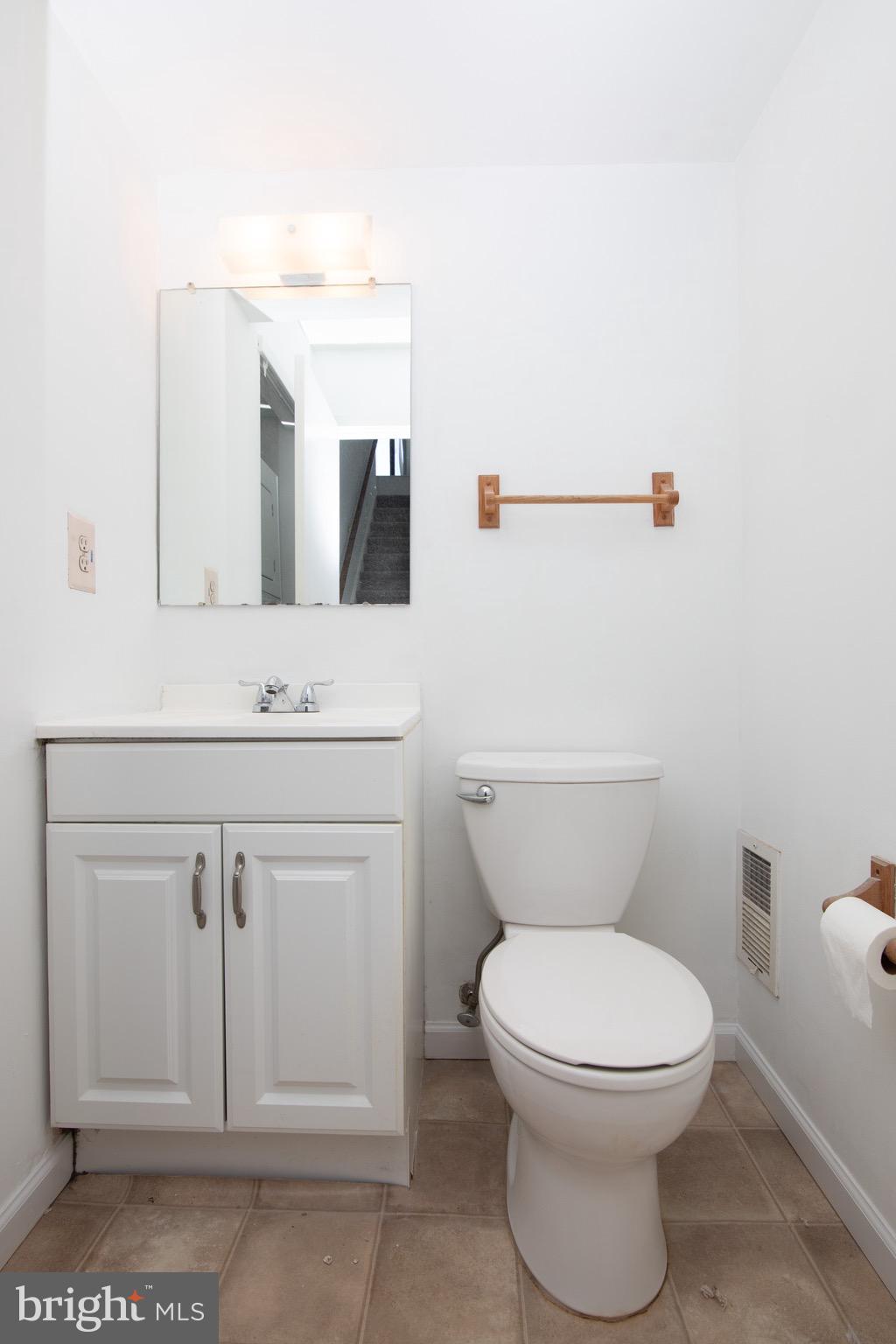 402 Gregorys Way Voorhees, NJ 08043 - Photo 12 of 27 a bathroom with a toilet a sink and a mirror