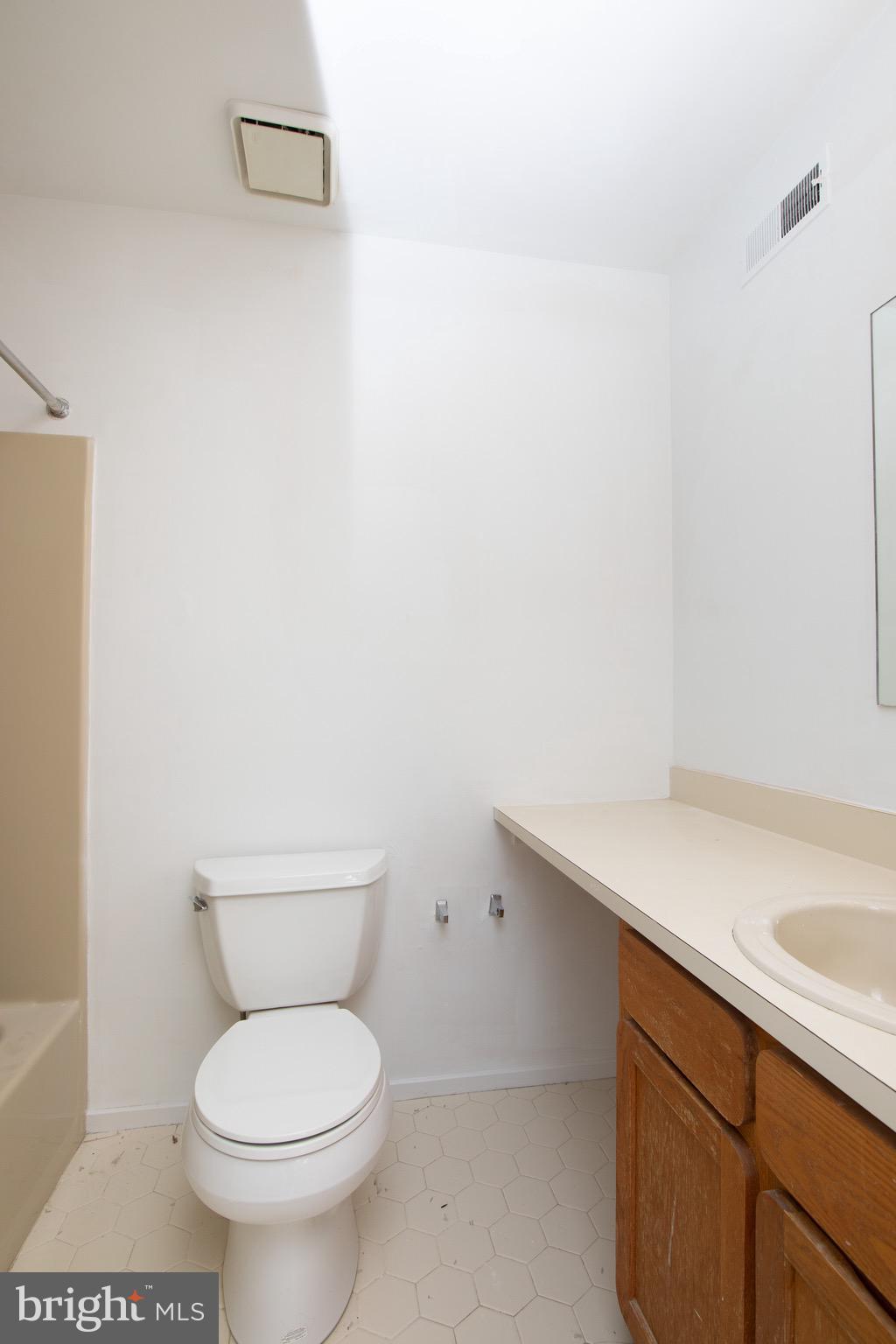402 Gregorys Way Voorhees, NJ 08043 - Photo 15 of 27 a bathroom with a toilet a sink and a shower