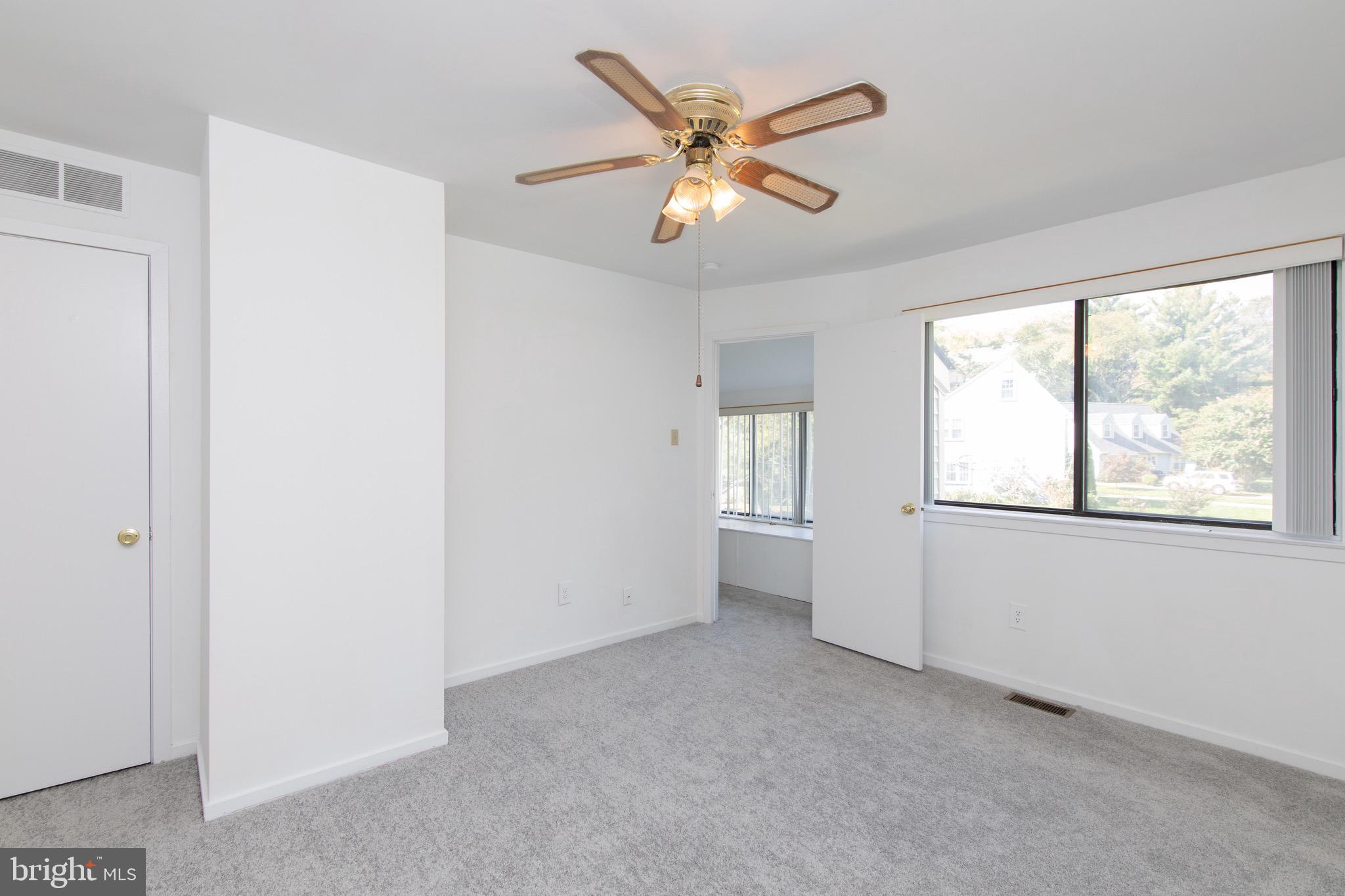 402 Gregorys Way Voorhees, NJ 08043 - Photo 16 of 27 a view of an empty room with a window