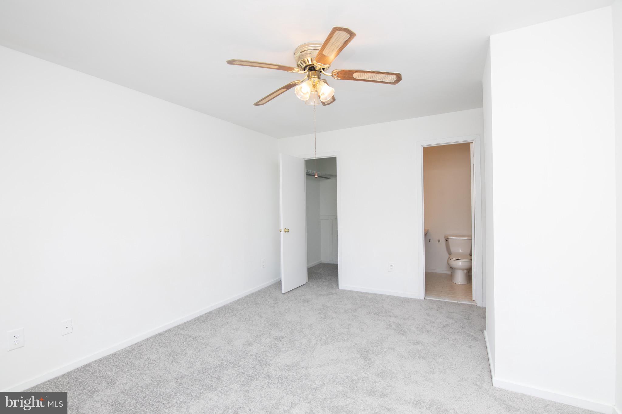 402 Gregorys Way Voorhees, NJ 08043 - Photo 18 of 27 a view of an empty room with a window
