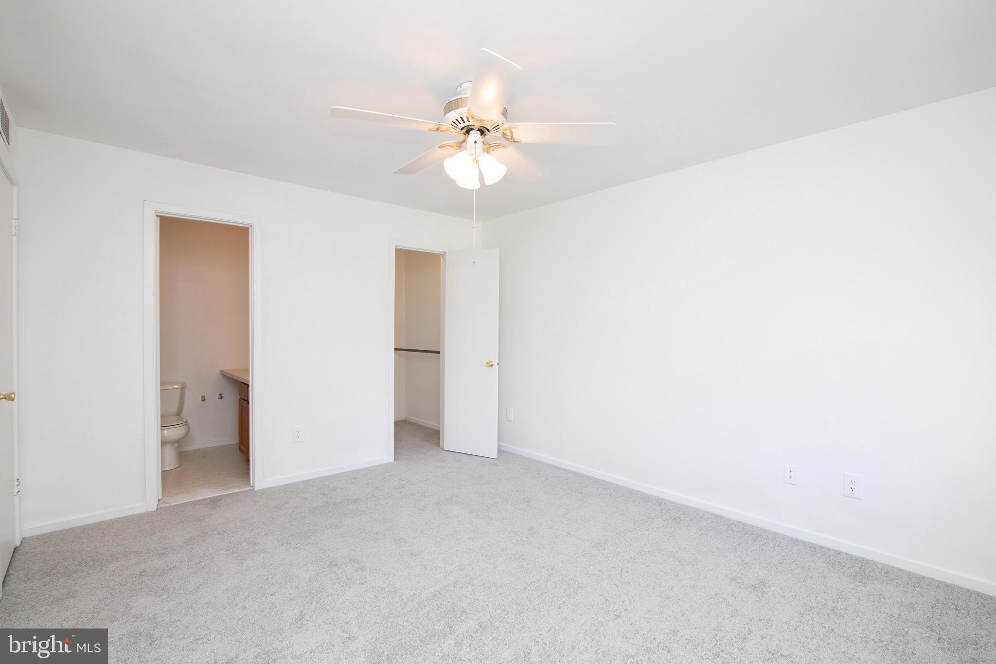 402 Gregorys Way Voorhees, NJ 08043 - Photo 19 of 27 a view of an empty room with a window