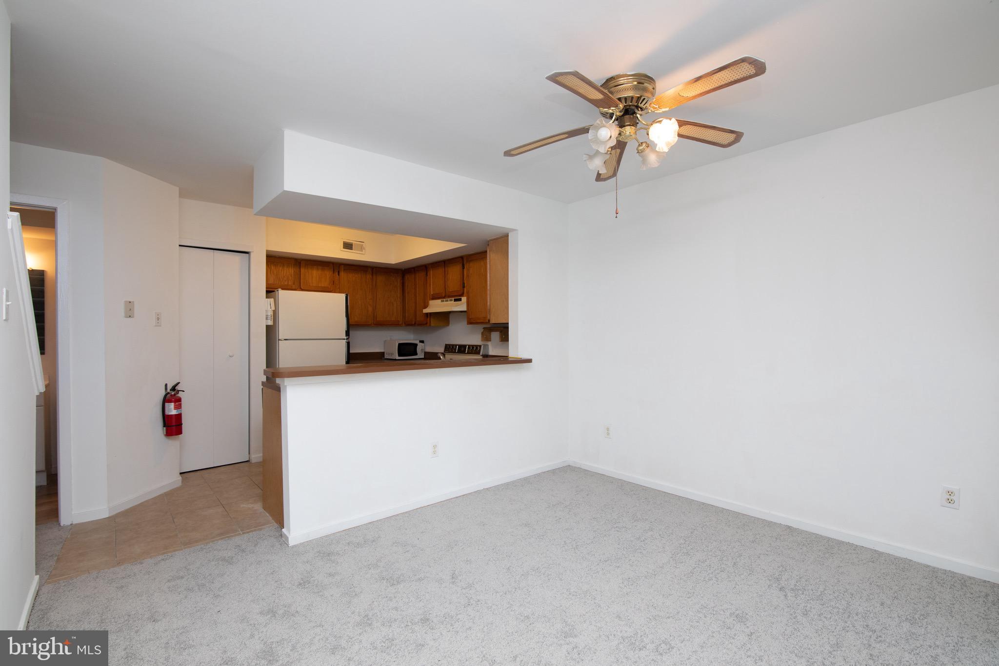 402 Gregorys Way Voorhees, NJ 08043 - Photo 4 of 27 a view of a livingroom with a ceiling fan
