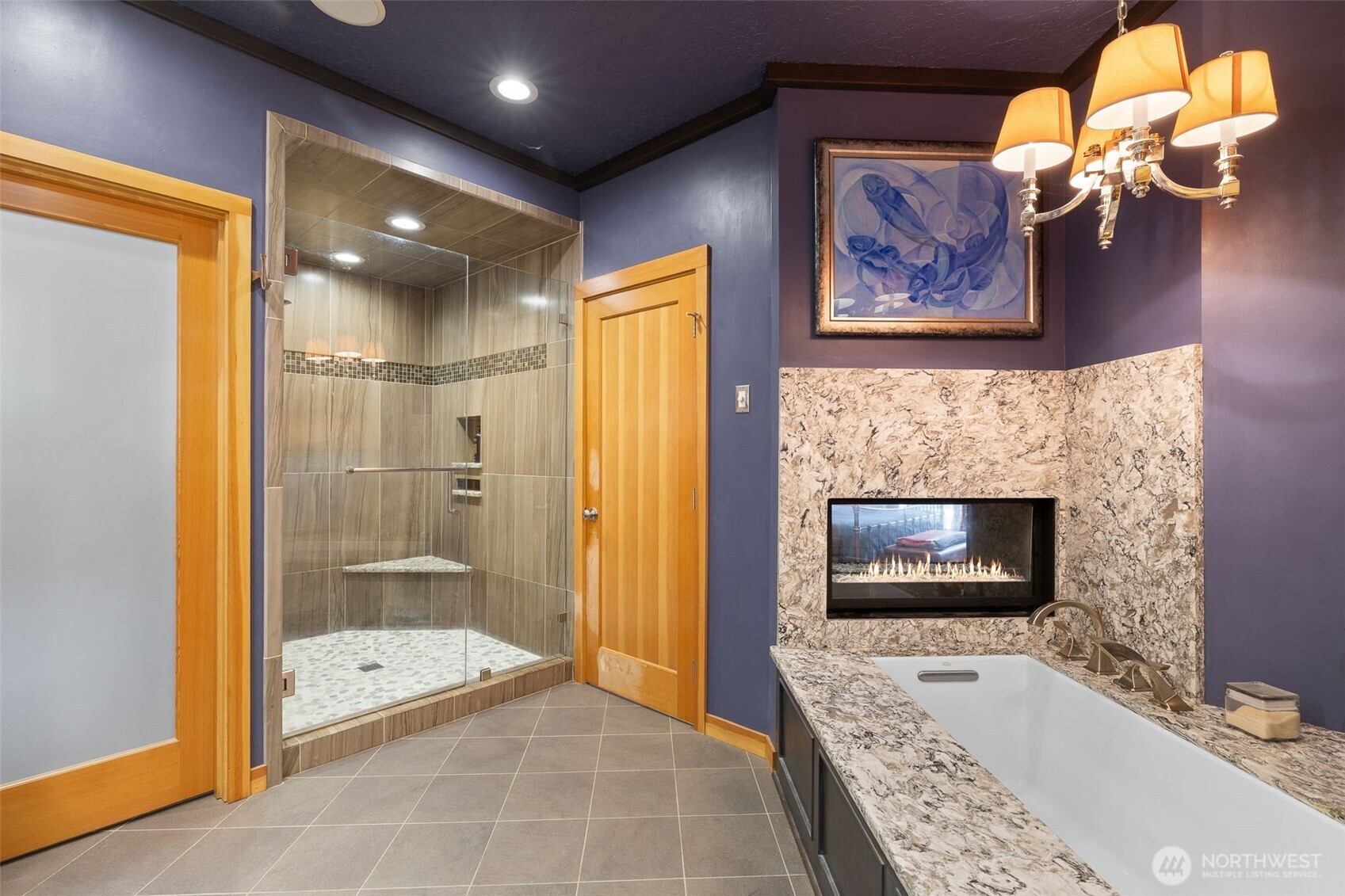 550 Manley Road Bellingham, WA 98229 - Photo 16 of 40 a bathroom with a tub a sink and glass door