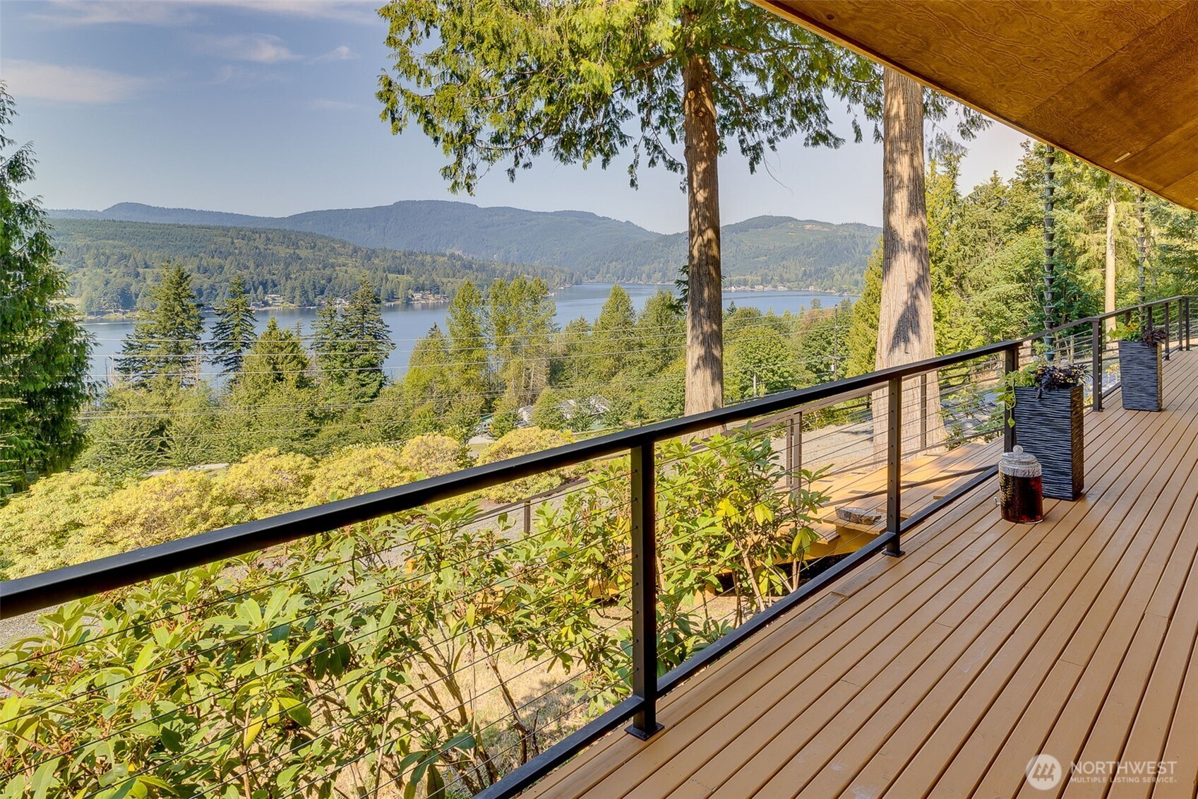 550 Manley Road Bellingham, WA 98229 - Photo 2 of 40 a view of balcony with wooden floor and fence