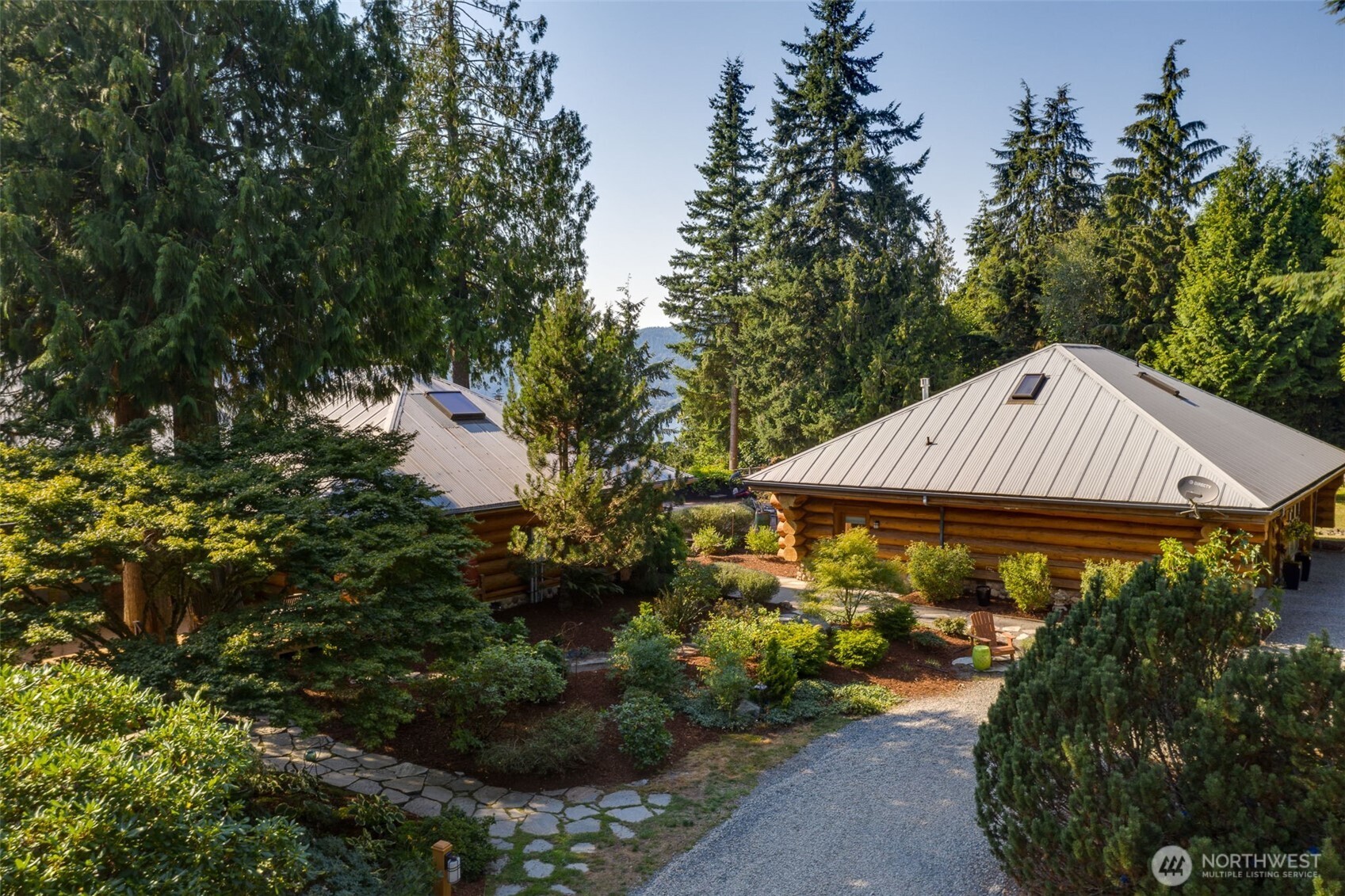 550 Manley Road Bellingham, WA 98229 - Photo 22 of 40 a view of a garden with plants and a garden