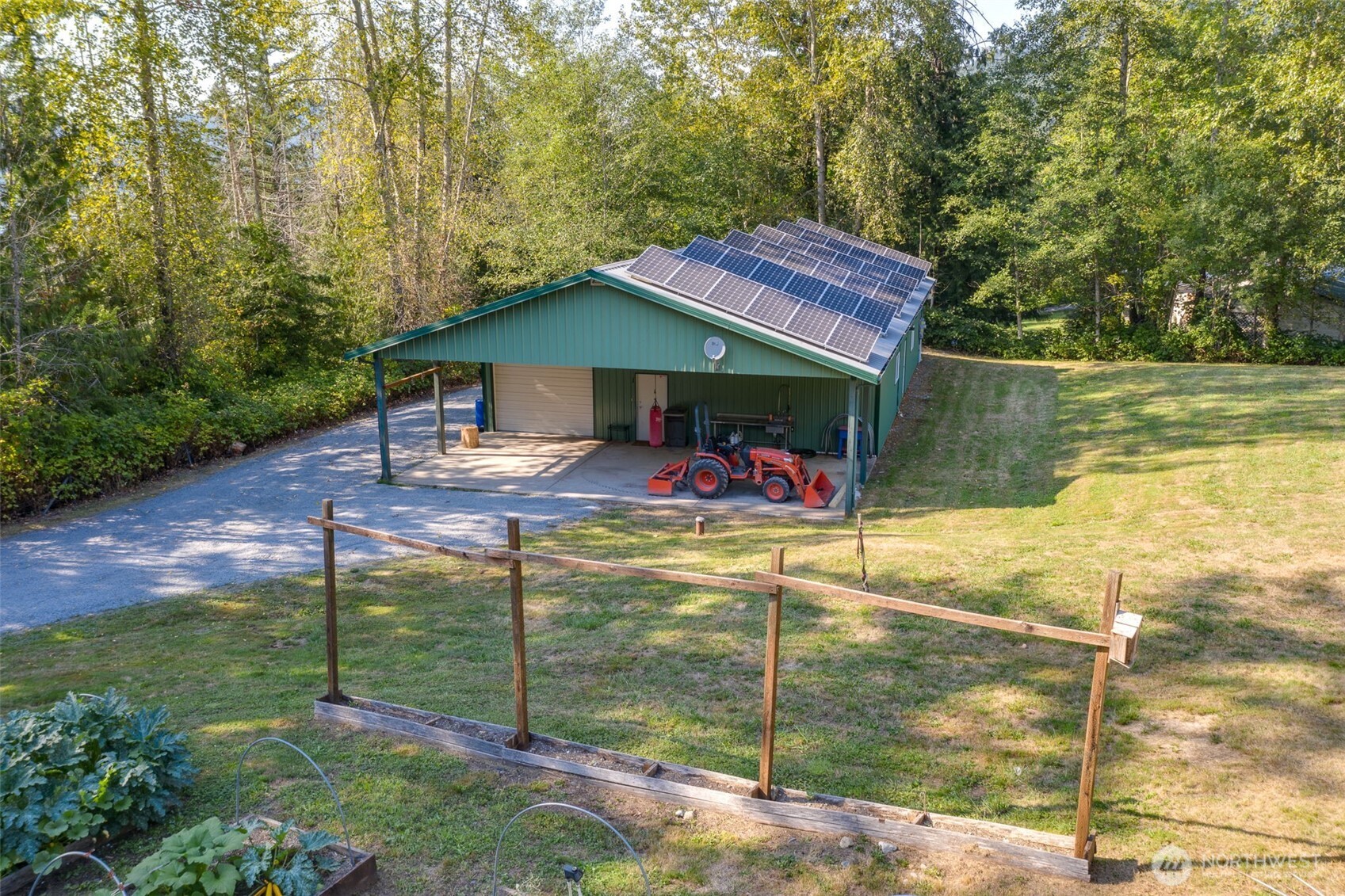 550 Manley Road Bellingham, WA 98229 - Photo 36 of 40 a backyard of a house with table and chairs
