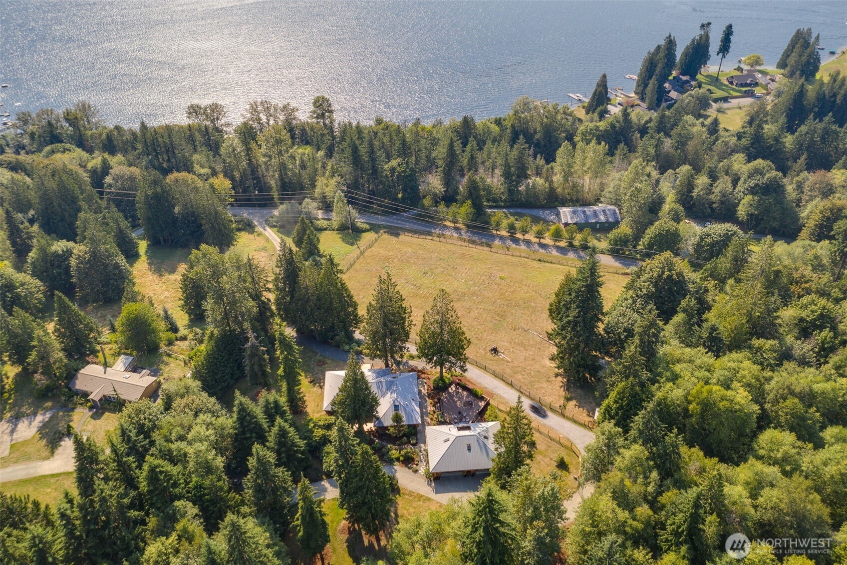 550 Manley Road Bellingham, WA 98229 - Photo 38 of 40 a view of a lake with a building in the background