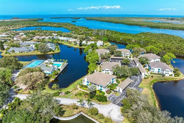 a view of a city with an ocean