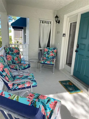a living room filled with furniture and a couch