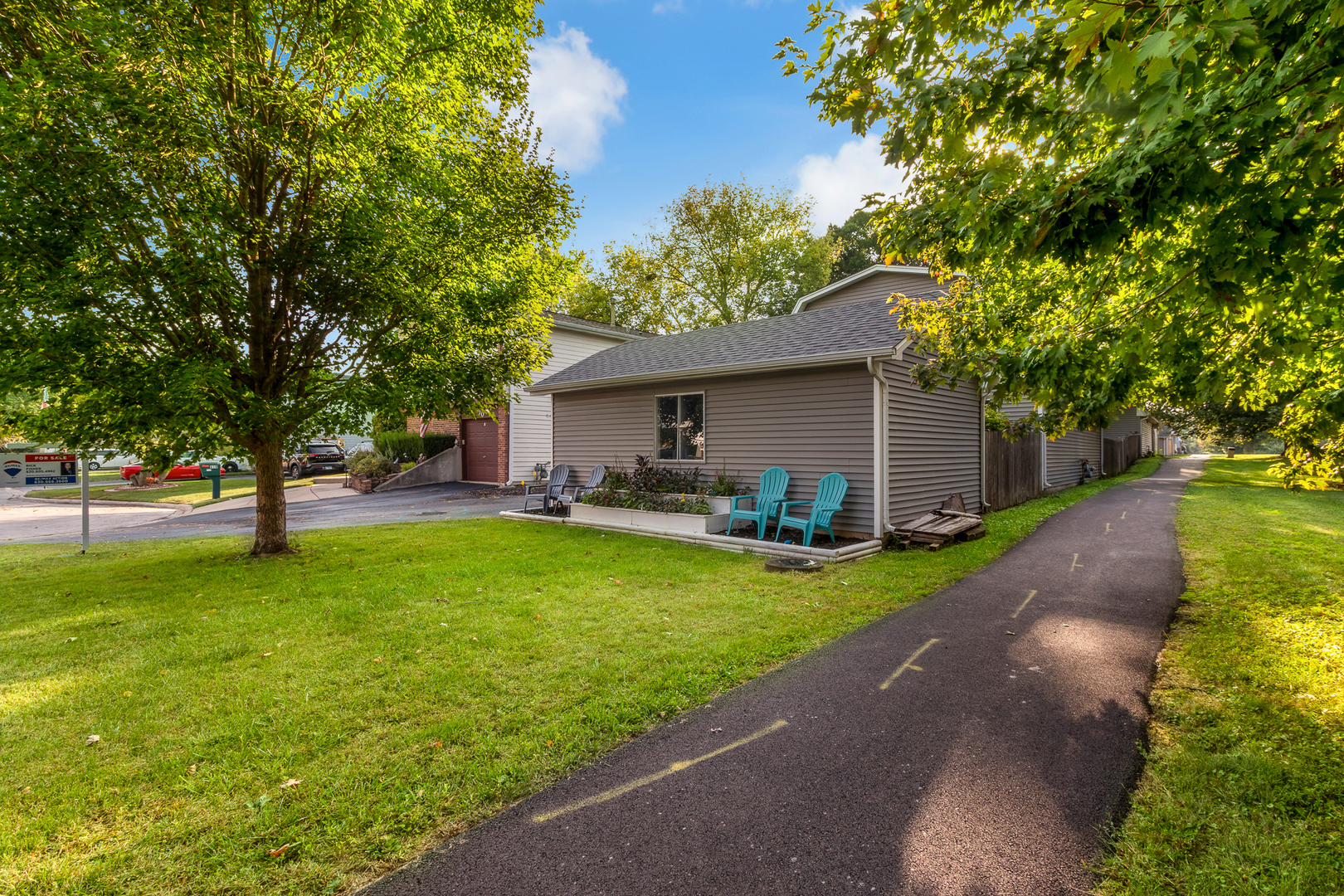 614 Kamiah Court Carol Stream, IL 60188 - Photo 25 of 30 a front view of house with yard and trees