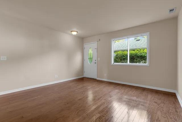 an empty room with windows