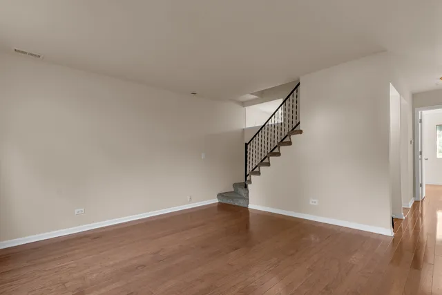 a view of entryway with wooden floor