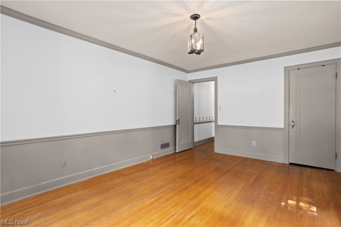 1920 Grafton Road Elyria, OH 44035 - Photo 17 of 35 First floor master bedroom has crown molding and a chair rail
