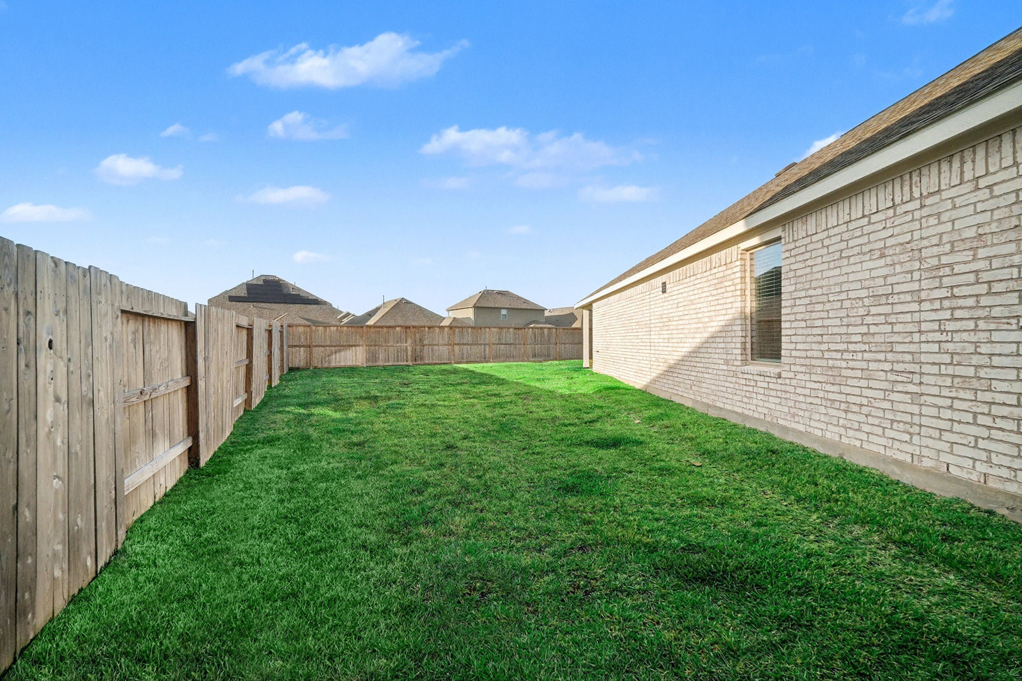 8427 Blue Shell Lane Cypress, TX 77433 - Photo 25 of 27 Side view of this incredible backyard.