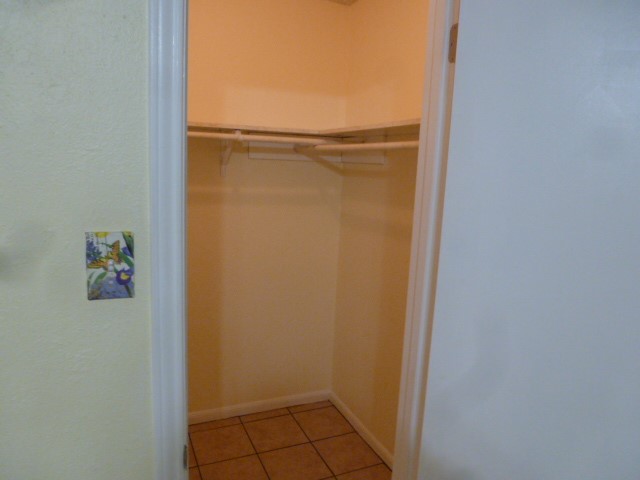 5006 Sara Drive, Unit A Austin, TX 78721 - Photo 9 of 10 a bathroom with a glass door