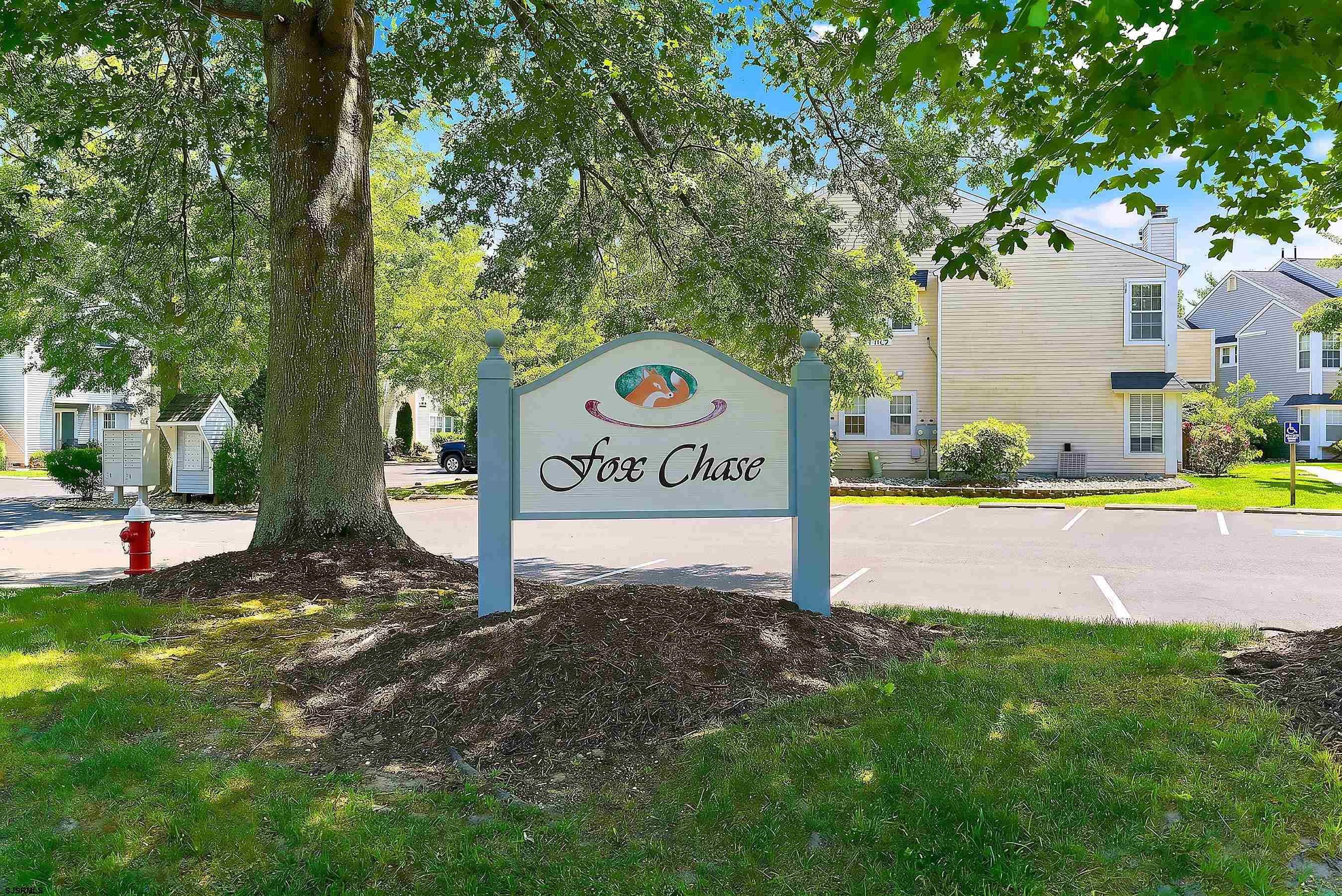 224 Meadow Ridge Road, Unit 224 Smithville, NJ 08205 - Photo 17 of 22 a street sign that is sitting in the grass