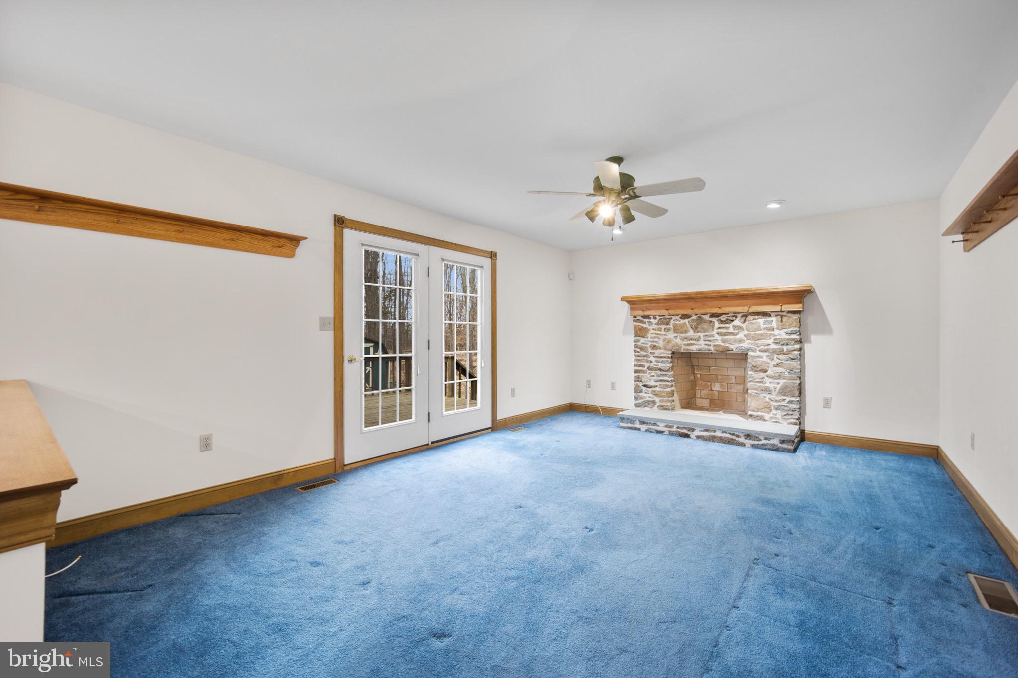 735 Creamery Road Quakertown, PA 18951 - Photo 14 of 46 Family Room w/Stone Fireplace