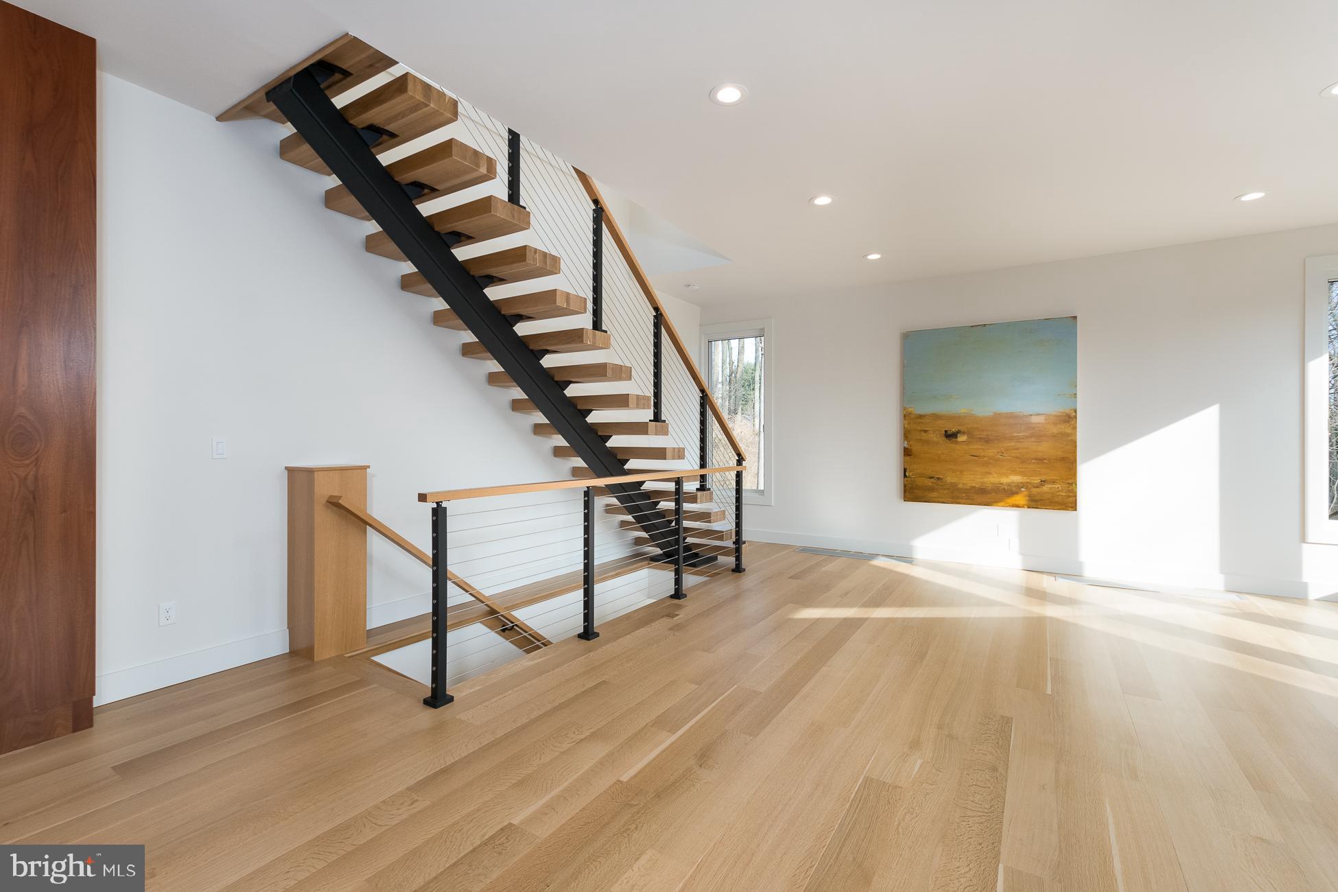 144 Drakes Corner Road Princeton, NJ 08540 - Photo 19 of 49 Living Room with Floating stairs to Main Bedroom