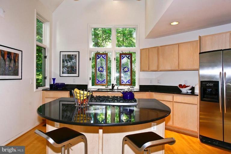 11584 Greenwich Point Road Reston, VA 20194 - Photo 11 of 23 a table with chairs and window