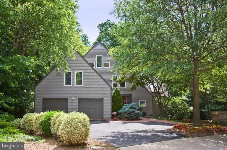 11584 Greenwich Point Road Reston, VA 20194 - Photo 10 of 23 a front view of a house with a yard and garage