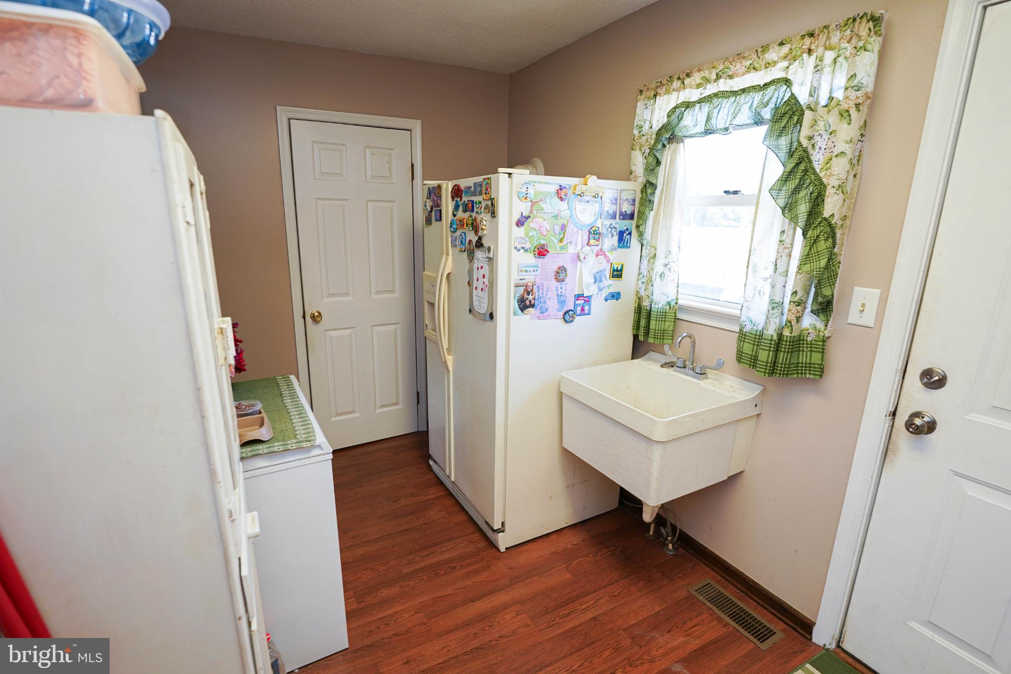 27949 Phoenix Church Road Marion Station, MD 21838 - Photo 22 of 82 Cozy kitchen with natural light and charm.