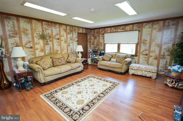 a bath room with a sink and a mirror