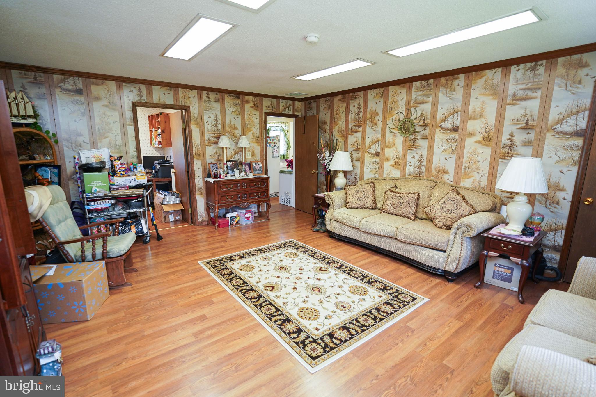 27949 Phoenix Church Road Marion Station, MD 21838 - Photo 28 of 82 Charming living space with vintage wallpaper.
