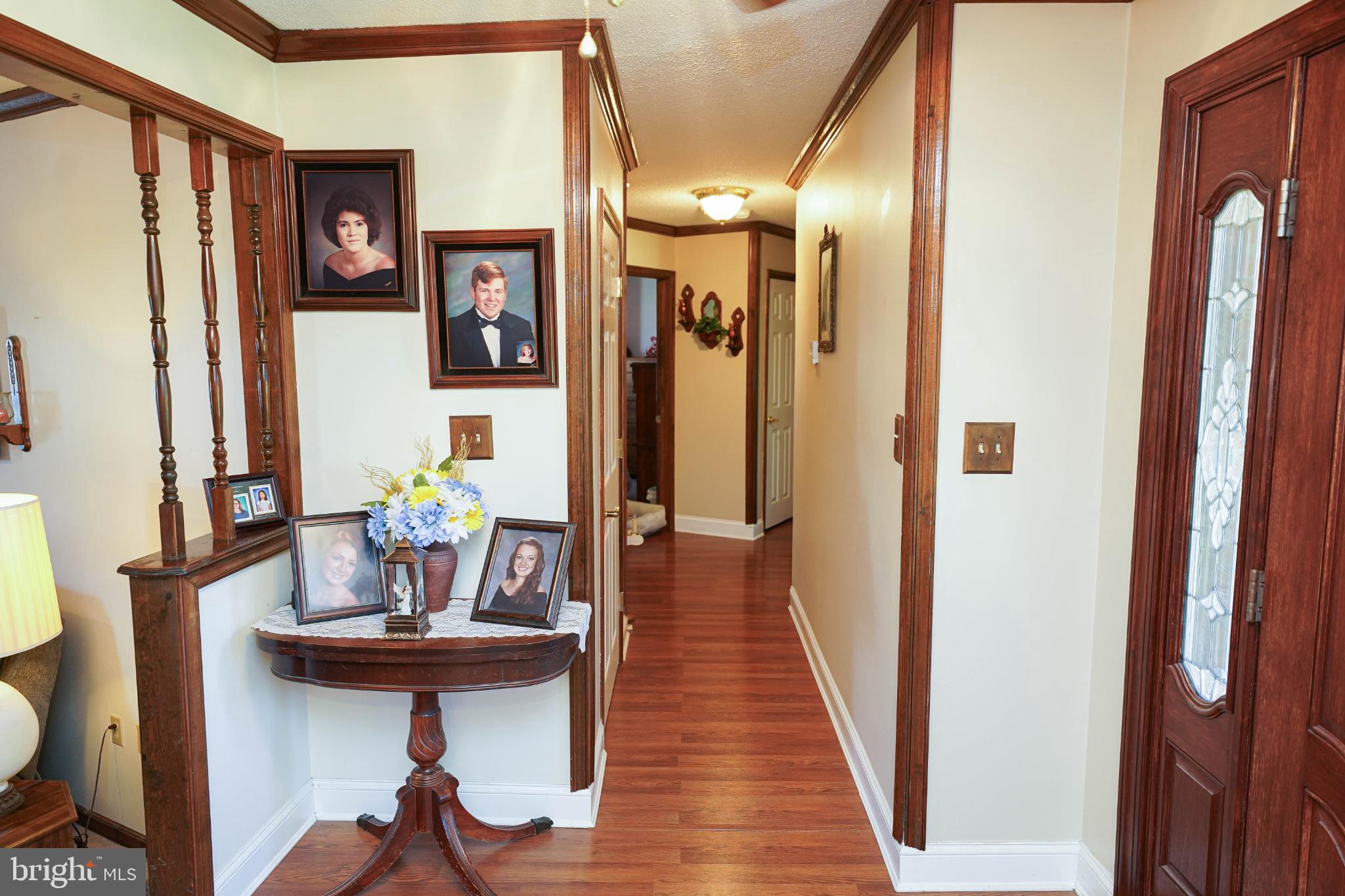 27949 Phoenix Church Road Marion Station, MD 21838 - Photo 31 of 82 Welcoming hallway with rich wooden accents.