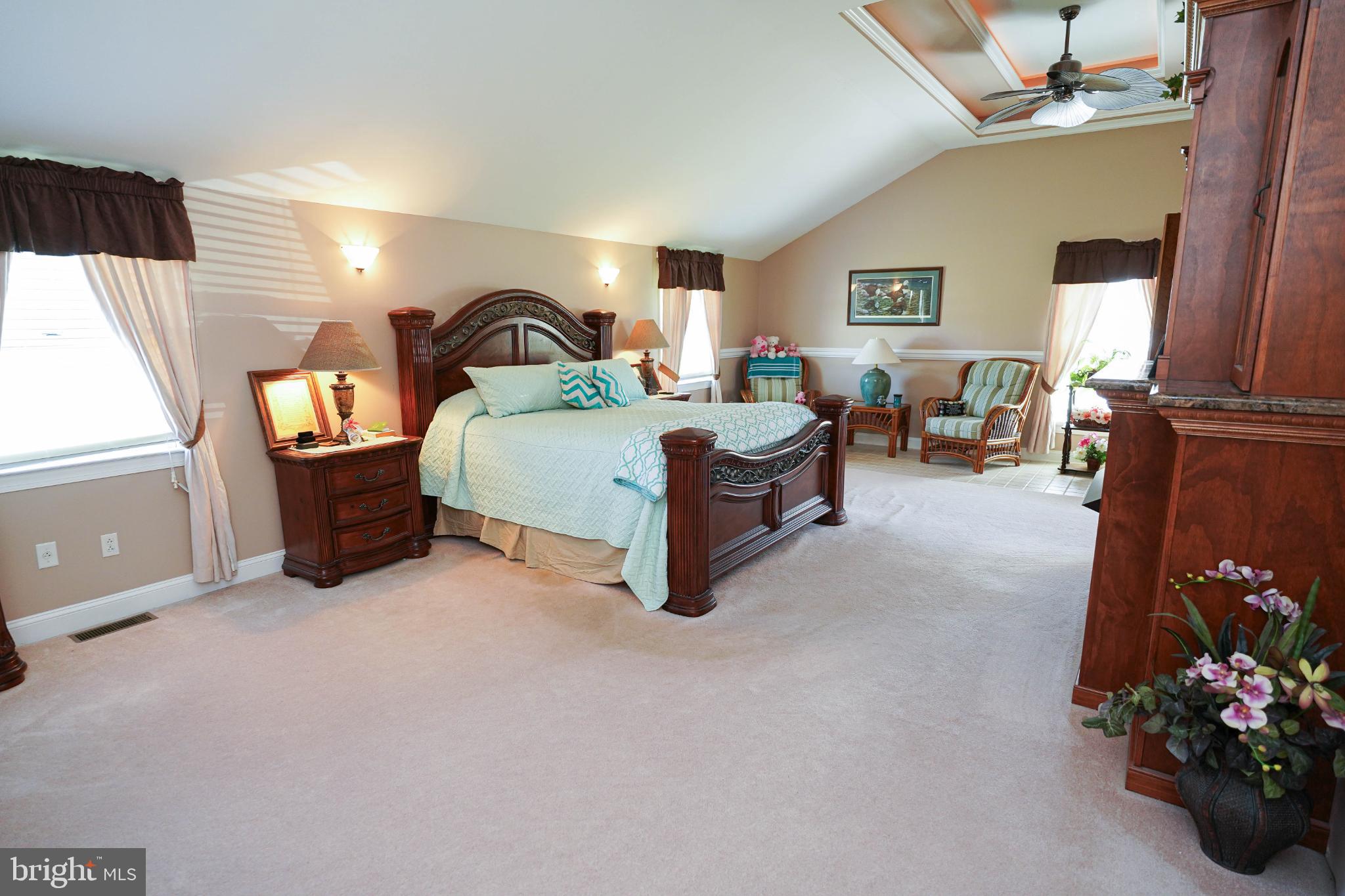 27949 Phoenix Church Road Marion Station, MD 21838 - Photo 34 of 82 a spacious bedroom with a bed and window