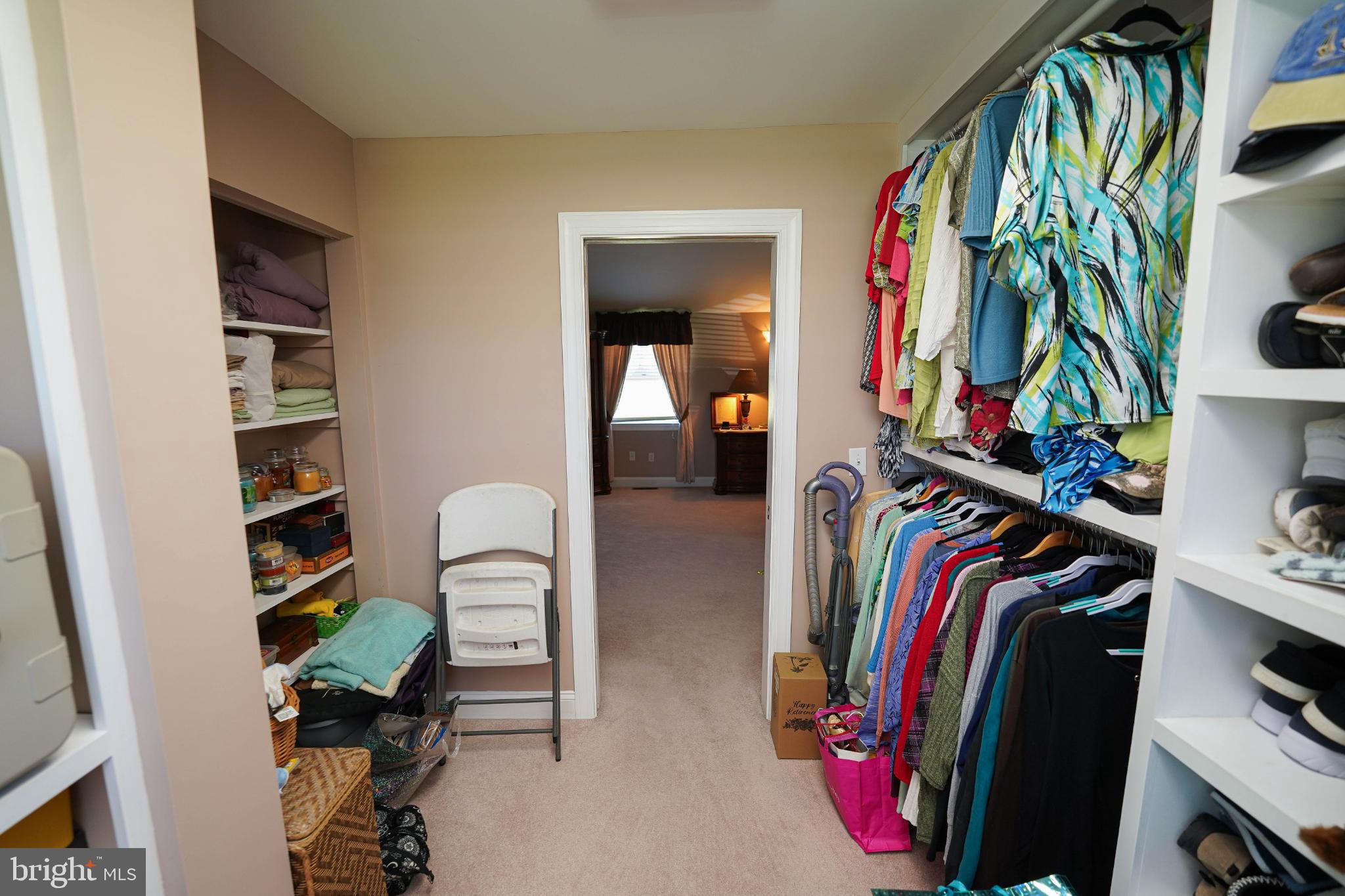 27949 Phoenix Church Road Marion Station, MD 21838 - Photo 39 of 82 a view of walk in closet with clothes and shoes