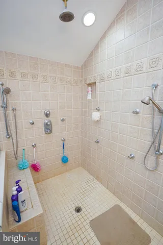 a view of a swimming pool with a yard