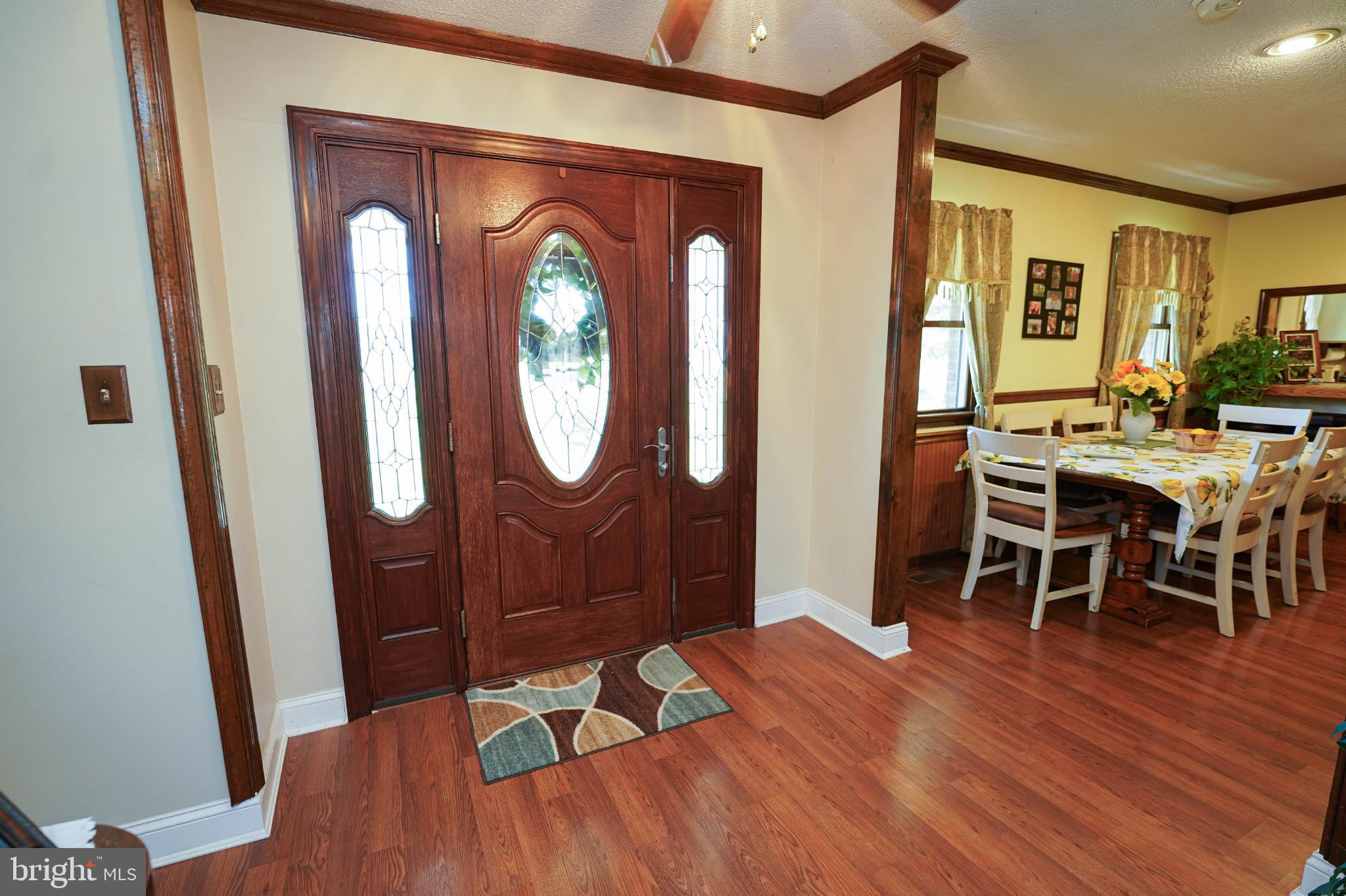27949 Phoenix Church Road Marion Station, MD 21838 - Photo 5 of 82 Welcoming entryway with elegant wood accents.