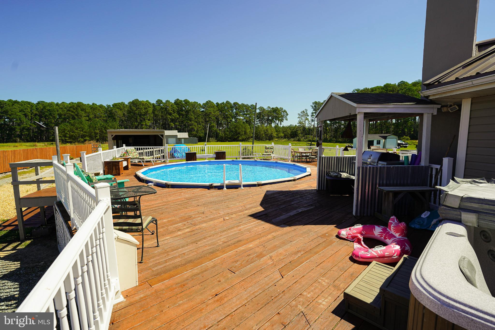 27949 Phoenix Church Road Marion Station, MD 21838 - Photo 79 of 82 Sunny retreat with poolside relaxation.
