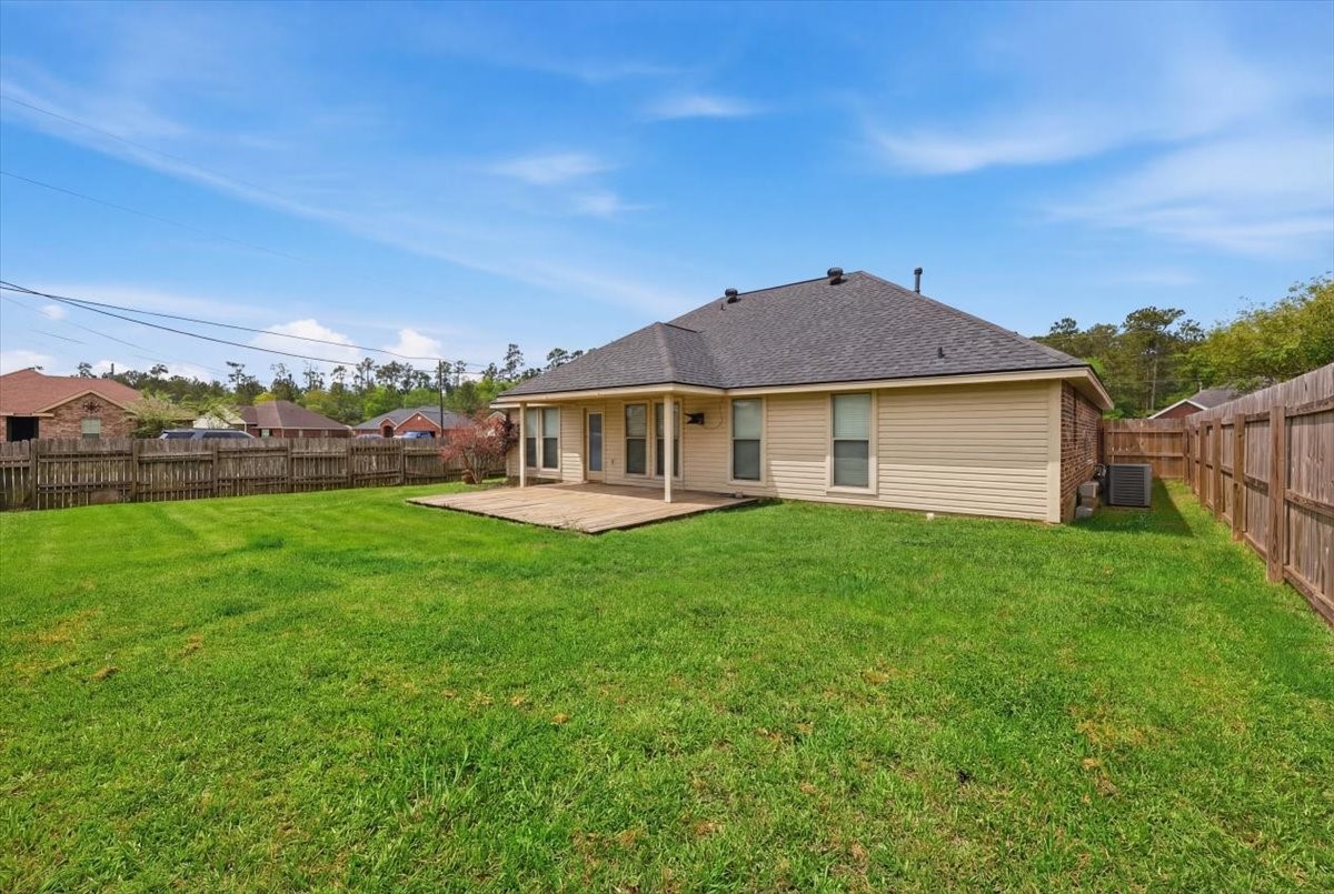5585 Westchase Loop Lumberton, TX 77657 - Photo 11 of 13 a view of an house with backyard space and balcony