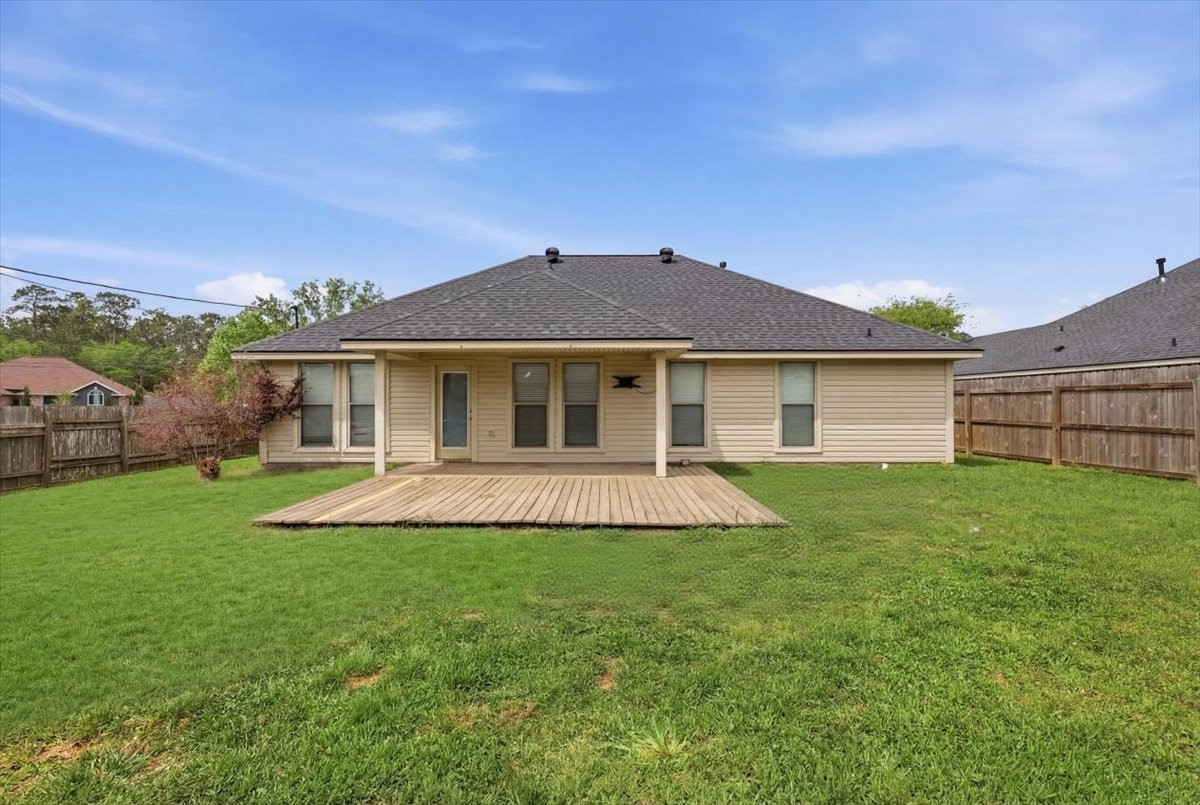 5585 Westchase Loop Lumberton, TX 77657 - Photo 12 of 13 a front view of a house with a yard
